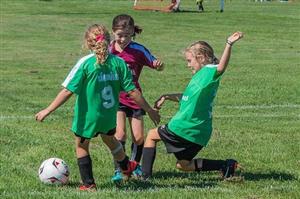 3 Young Girls During A Soccer Match